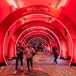 One challenge the VDA team had to overcome was the splitting up of the conference's trade show floor, aka the HUB, into two ballrooms. This arch tunnel—meant to evoke how the modular CrowdStrike platform operates—connected the two sides. 'It was probably the most photographed thing from the whole show,' Breen says. 'That was a super successful way of connecting the two halves of the HUB, and making CrowdStrike's platform the core focus of that connection.'