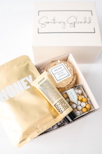 You can select items to fill one of Something Splendid's gift boxes or choose one of the already curated options like the You're So Golden Gift Box ($60), which includes a candle, a face mask, hand cream, and Sugarfina candies.
