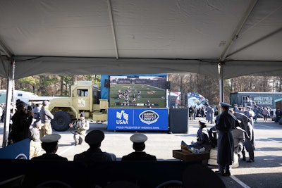 The cadets and midshipmen could play on gaming kiosks for fun or enter the 32-person tournament where the finalists played on a big screen on the side of a converted military cargo vehicle.