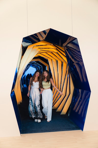 An artsy entry tunnel that resembled the Chase logo was a popular photo spot for guests.