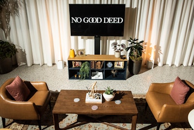 Inside, the space was a warm, cozy lounge mimicking an inviting open house, including modern furniture, framed stills from the show, and other home accessories. A ticket brochure and business cards were used to bring a true open-house feel to the premiere.