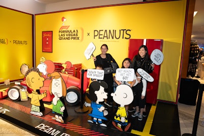 In a fun moment, shoppers could enjoy a racing-themed Peanuts photo op.