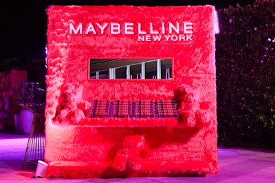 Maybelline decked the Teddy After Dark party on Thursday night with fuzzy pink elements, including a massive 3D-printed teddy bear covered in fur and a double-sided buildout (pictured). It featured a branded photo backdrop with a lip-shaped couch and pillows on one side and a lip gloss bar with complimentary products on the other.