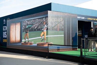 Anamorphic LED screens on the exterior of the activation space attracted fans to the footprint.