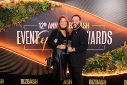 Many guests didn't leave without snapping a photo in front of this greenery-filled step-and-repeat fabricated by Brand Activation Services.