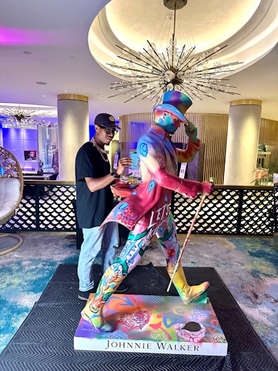 On Thursday night, Johnnie Walker’s iconic 'Striding Man' arrived. Guests sipped signature scotch creations and watched as the 6-foot statue was transformed into an art deco-inspired masterpiece.