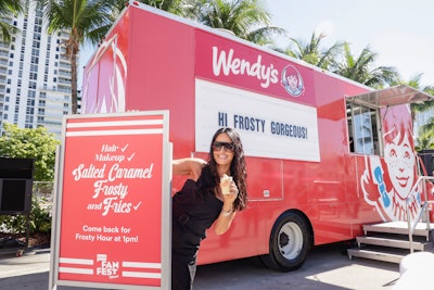 Event sponsor Wendy’s tapped ambassador and The Real Housewives of Salt Lake City star Lisa Barlow to serve the brand’s new salted caramel Frosty to attendees, along with fries and chicken sandwiches. Food truck signage called back to one of Barlow’s signature quotes from the show: “Hi baby gorgeous!”