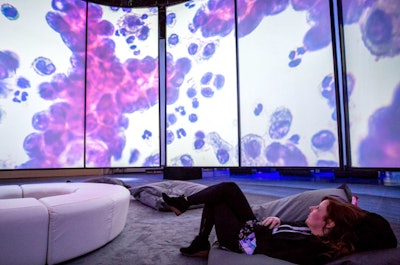 At an event as large as the 2018 edition of the IBM Think conference—held in Las Vegas and produced by Drury Design—the 30,000 attendees could use some moments of calm. They found it in a unique breakout moment that also spotlighted the brand's capabilities: The Think Gallery showcased six of IBM’s projects using 18-foot-high digitally mapped video screens that surrounded visitors and allowed them to sit and think about what they were watching. See more: https://www.bizbash.com/bizbash-lists/meetings-conferences/media-gallery/13483268/most-innovative-meetings-2018-2-ibm-think