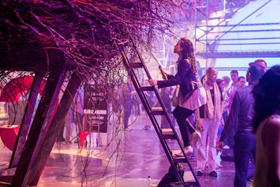 At C2 Montreal 2015, creativity soared—literally—with 'The Nest,' a 30-foot-wide, tree-branch structure perched 10 feet above the ground. Participants climbed a ladder into this elevated breakout space, where a moderator facilitated intimate discussions. The journey ended on a playful note, with attendees using a slide to get back to the ground, embodying the conference’s spirit of innovation and fun.