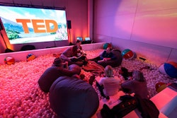 The 2015 TED Conference in Vancouver brought a playful twist to its lounges, where attendees could watch speaker simulcasts. A standout was the new ball pit, filled with beanbag chairs and beach balls, offering a relaxed and whimsical setting to absorb big ideas while fostering creativity and connection.