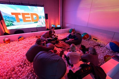 The 2015 TED Conference in Vancouver brought a playful twist to its lounges, where attendees could watch speaker simulcasts. A standout was the new ball pit, filled with beanbag chairs and beach balls, offering a relaxed and whimsical setting to absorb big ideas while fostering creativity and connection.