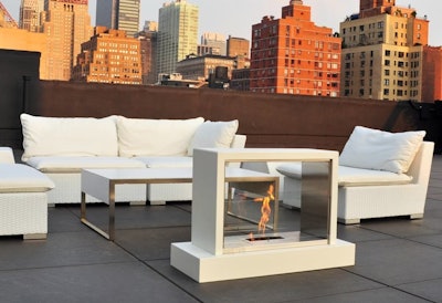 For a safe and subtle fire experience that can easily blend into the decor, rental company Taylor Creative Inc. has a freestanding, modern fireplace with a white laminate base. It runs with “real flame” gel, which is poured into the cavity and then lit.