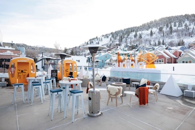 During Sundance 2024, Audible returned to Main Street with The Audible Listening Lodge. Attendees could visit the branded space that offered scenic views of Park City, Utah; fireplaces; heat lamps; blankets; and a selection of Audible projects presented in vibrant orange listening gondolas. The outdoor patio also featured a heated yurt where visitors could enjoy hot beverages, empanadas, s’mores, and more. See more: 2024 Sundance Film Festival: See Inside Activations From Disney, Adobe, Chase Sapphire, and More
