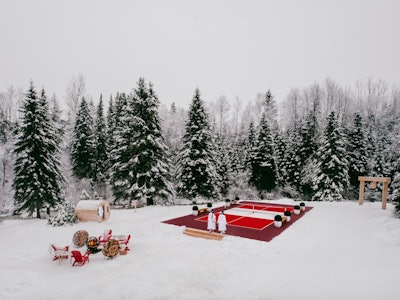 In early 2024, Destination Canada unveiled what it’s calling the “world’s first winter pickleball spa” at Quebec’s winter wonderland. The DinkDunk Pickleball Spa features a pickleball court tucked in the Canadian wilderness. The experience also features luxury spa amenities like massages and a cold plunge station built into a national riverbank—and, to warm guests up, a sauna and outdoor hot tub, plus a selection of Quebecois charcuterie and snacks.