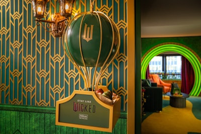 The suite offers various themed experiences and special touches like breakfast delivered by a floating balloon.