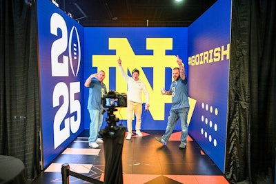 Fans could pose in a customizable photo booth, which was able to display backgrounds for both teams.