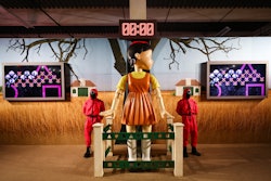 Squid Game: The Experience in NYC allows fans to enter the world of the series and participate in the games they’ve seen on screen, including 'Red Light, Green Light' under Young-hee’s watchful eye.