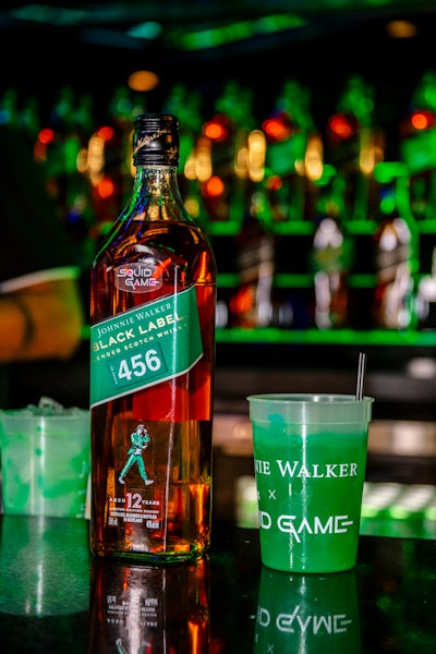 Johnnie Walker unveiled a limited-edition bottle design of Black Label with numbers ranging from 001 to 456—the number of players featured in the series. The bottle’s label features a custom fabric pattern varnish to simulate the texture of the show’s famous green tracksuit, and the iconic Johnnie Walker Striding Man logo dons the distinctive tracksuit.
