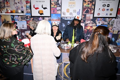 The hat station allowed guests to personalize caps by decorating them with custom pins and CFP-themed patches.