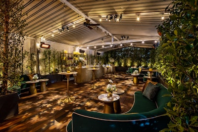 'A sophisticated pallet of golds, creams, and greens were used in the design,' said Jennifer Wang, principal at JWang Consulting. 'We wanted the guests to step into an environment that was both chic and fun.' Florals were handled The Petal Workshop, while plants came from Jackson Shrub.