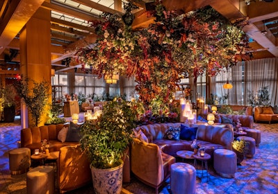 'We switched venues this year to LAVO in West Hollywood and leaned into their warm, chic aesthetic,' added Mazzuca. 'Through lush, full florals, we layered some pops of color into their abundant existing foliage—focusing on deep berry and burgundy tones, paired with warm rusts, cool mauves, and creamy ivory.' Bespoke Bohéme worked with Shine On Lighting Co. and Launch AV on lighting elements (Launch AV also provided AV). Florals came from The Petal Workshop, and candles came from Vogue Candles.