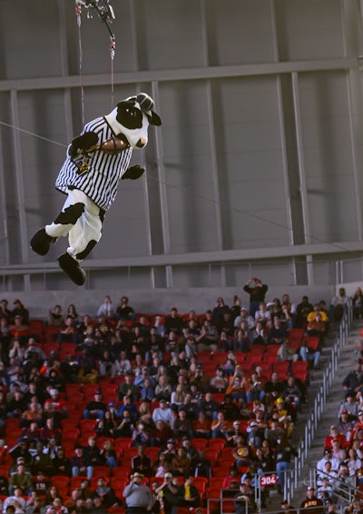 In an extra-fun touch, Chick-fil-A had a cow rappel onto the field to deliver the game ball.