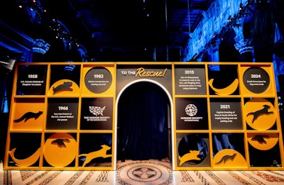 The Humane Society of the United States' 'To The Rescue!' Gala was held in November 2024 at Cipriani 42nd Street. This was the 15th year of the gala, which Eventique has produced since its inception. Because it was also the organization's 70th anniversary, the team featured some of its milestones at the entrance, which doubled as a photo moment.
