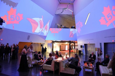 The Royal Ontario Museum also celebrated Canada's anniversary with its ROM Ball. The event, which showcased musician and photographer Bryan Adams’ photo exhibition of 28 Canadian icons called “Canadians,” featured wall projections of the Canadian flag and red “150” maple leafs. The event was designed by digital video company the Mustard Shop, event designer William Fulghum, and the lieutenant governor of Ontario's gala team. See more: 18 Highlights From Canada’s 150th Anniversary Celebrations