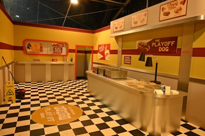 Modeled after Atlanta drive-in The Varsity, this space offered up chili cheese dogs, while staff provided paper hats resembling those of the legendary restaurant, which featured the Party at the Playoff logo.