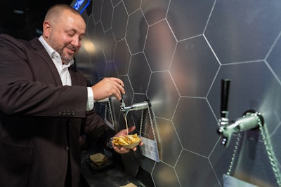 M Culinary Concepts offers a 'Nacho Cheese on Draught' station.