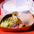 In addition to creating innovative dishes for events—like this clever taco housed in a Fritos bag—M Culinary and its partner, Waste Not, rescue more than 40,000 pounds of food annually, feeding tens of thousands of Arizonans contending with food insecurity. “We’re filling bellies, not landfills,” says Stavros.