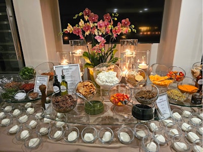'Whether it’s a corporate event for thousands, a holiday party for hundreds, or an intimate fete for dozens, the same meticulous attention to detail assures success and client satisfaction every time,' says Roth-Oseary. (Pictured: a 'burrata bar' the team created at an event.)