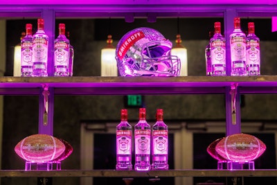 The event was hosted by NFL brand ambassador Ryan Mitchell—and in a fun touch, decor included a mirrored, branded football helmet and decorative, sparkling footballs.