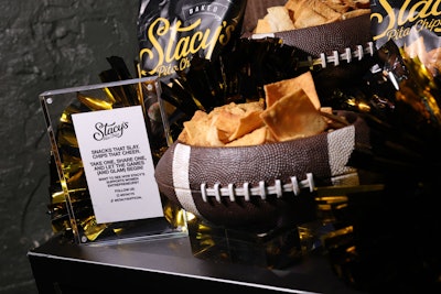 Female-founded company Stacy's Pita Chips was on site, serving an appetizer of crabmeat and Cajun caviar balanced atop one of their Simply Naked baked pita chips.