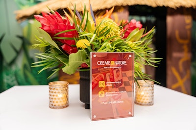 Floral arrangements reflected the brand’s signature colors, while signage shared Instagram and TikTok handles to encourage guests to post and tag.