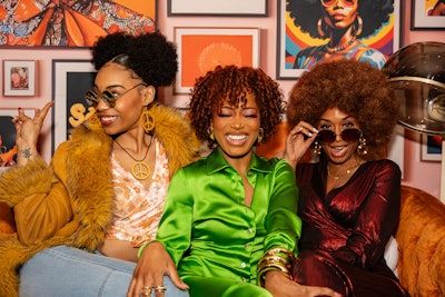 Keke Palmer, Creme of Nature’s chief brand officer, was on site to mingle with guests and lead a discussion about the history of Black hair. She also paused to pose in a vignette inspired by the brand’s 1970s roots, where models wore hairstyles from the era.