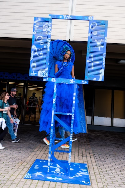 Other ACE performers included sky drummers with custom logos, “gate girls” dressed as Southern bells on ladders, two 'living art' frames, and more.