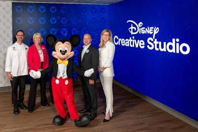 Leaders from Disney Meetings & Events are joined by Mickey Mouse to unveil the newly reimagined Disney Creative Studio at Walt Disney World Resort in Florida.