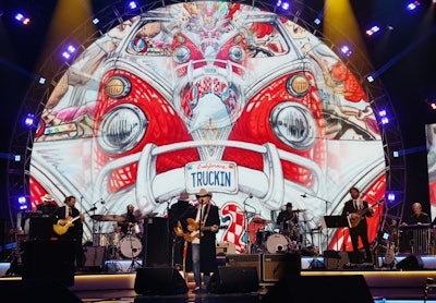 The MusiCares gala nodded to the Dead's quintessential tie-dye and other defining imagery; there were also several Dead-themed dishes, including a 'Friend of the Devil's Food Cake.' Artists like Norah Jones, Zac Brown, Noah Kahan, John Mayer, and Dwight Yoakam (pictured) performed tributes to the band.