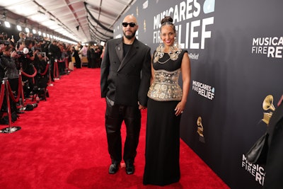 The ceremony took place on Feb. 2 at the Crypto.com Arena. Music's biggest stars—like Alicia Keys, who was honored with the Dr. Dre Global Impact Award—posed on the red carpet in front of the MusiCares Fire Relief logo.