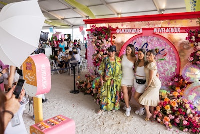 LaCroix had a floral-themed photo wall activation that offered both printouts and digital photo files.