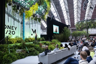 At Money20/20 Europe, held in Amsterdam in June 2024, the Na.i.ture Stage was originally conceived with a tree canopy to provide shade from the glass ceiling. The nature theme was then used to tie into the broader 2024 event theme of 'Human x Machine,' with the team imagining what a tree- and plant-based stage design would look like if created by AI. The resulting stage was a hybrid design featuring black steel and LEDs for the roots, plus tree trunks and real plants and foliage for the bushes and canopy. To ensure the stage was as sustainable as possible, all the plants used were replanted in local greenhouses after the show. See more: 8 Steal-Worthy Engagement Strategies From Money20/20 Europe