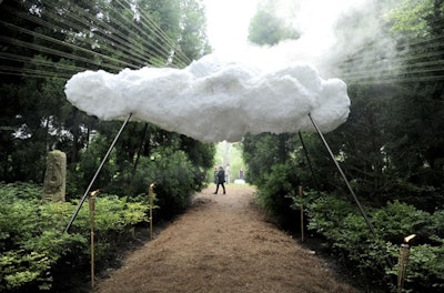 The Watermill Center’s 2014 benefit in New York had a series of fairy tale-inspired art installations. As the centerpiece of the entrance, Annick Lavallée-Benny's 'N.U.A.G.E.S.' was an imposing fixture constructed from wood, chicken wire, cotton batting, poly fill, and fishing line. The conception of clouds was inspired by the magical flying carpets that were featured throughout the benefit's 'One Thousand Nights and One Night: Sleeping Nights of Scheherazade' theme.