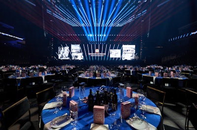 Donor tables on the arena floor offered light, shareable bites.
