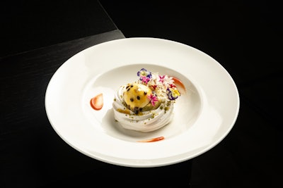 The hotel's executive pastry chef, Cynthia Keller-Sanchez, created Snow in the Tropics, a dessert course featuring pavlova, chamomile, guava, passion fruit, and pistachio, for the Saturday Tribute Dinner.