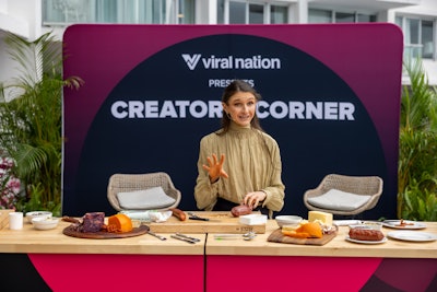 Blogger and influencer Tieghan Gerard (Half Baked Harvest) led a cheese and charcuterie demo at Creators' Corner & Terrace presented by Viral Nation.