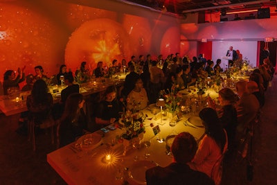 As guests dined, the room was transformed using tailored visuals (including giant tomatoes) and sounds.