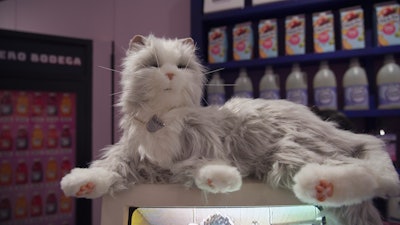 The space included bodega-inspired details such as an animatronic cat. There was even a custom ATM labeled “Concord Capital.'