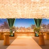 'The umbrella ceiling was a visual highlight and one of our favorite design elements,' said UNBOXED GROUP's Kyle Absolom. 'It featured over 600 white umbrellas, backlit to create a soft glow in that area.'