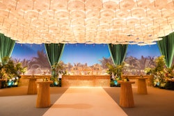 'The umbrella ceiling was a visual highlight and one of our favorite design elements,' said UNBOXED GROUP's Kyle Absolom. 'It featured over 600 white umbrellas, backlit to create a soft glow in that area.'